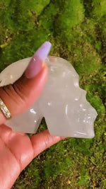 Load and play video in Gallery viewer, 10&quot; Inch Circumference Clear Quartz Crystal Skull With Lepidocrosite Inclusions